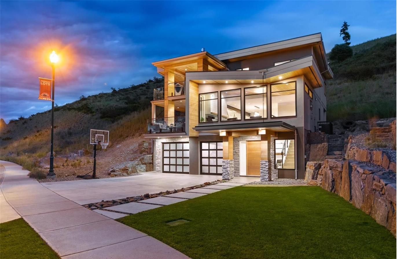 Mountainside. Butterfly roof custom home with income suite in Kelowna, designed and built by the Wiebes